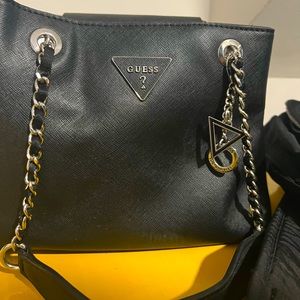 GUESS black leather bag with silver hardware, unused